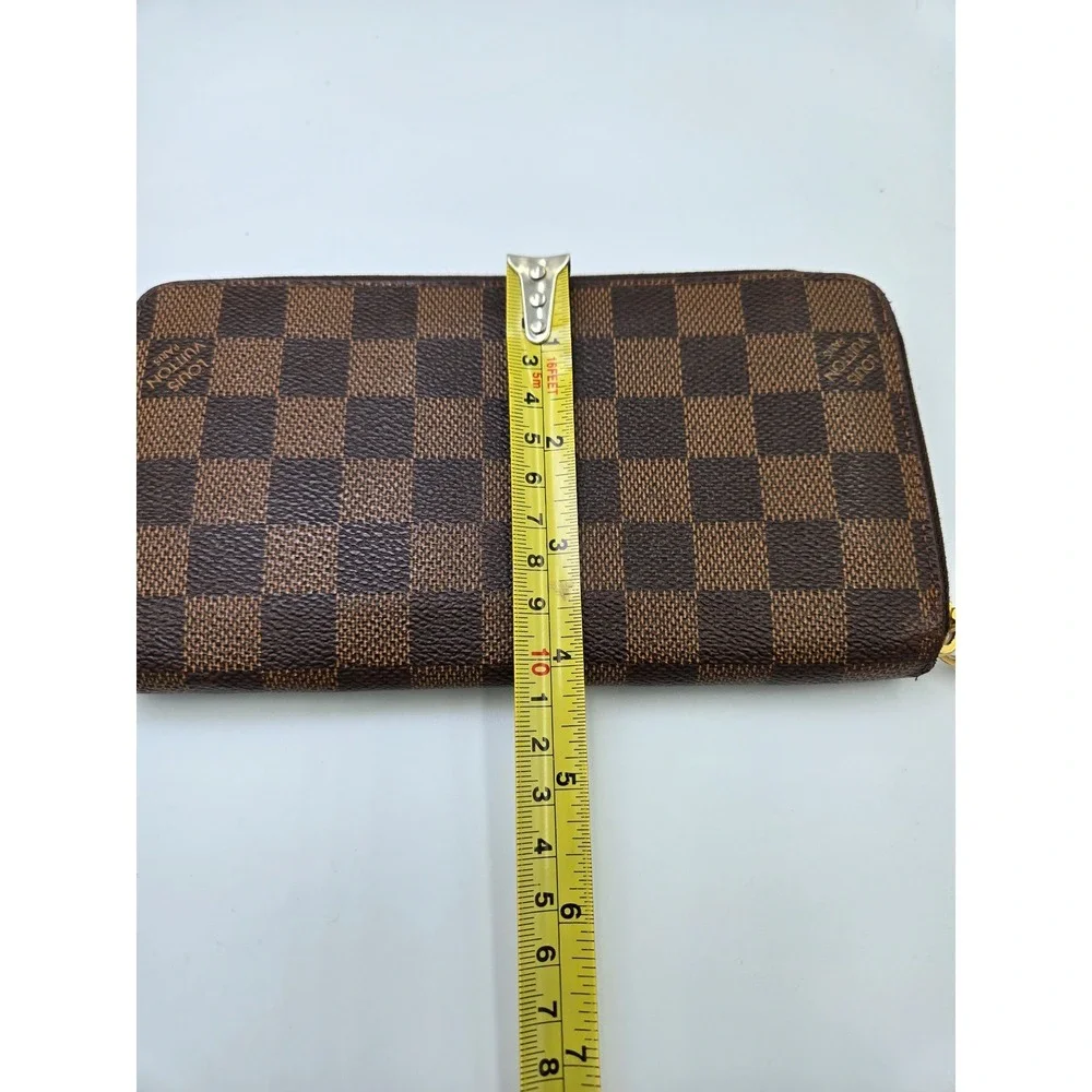 Louis Vuitton Damier Ebene Zippy Wallet Brown Coated Canvas